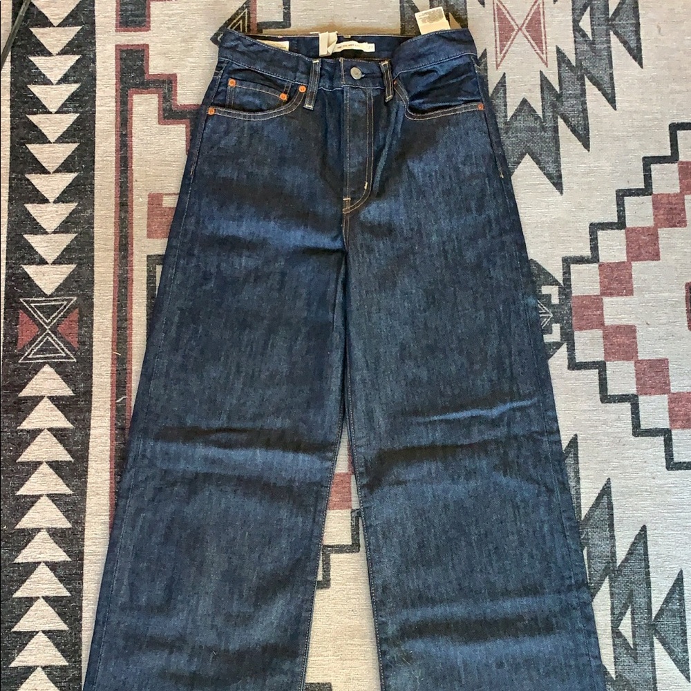 Levi’s Ribcage High Rise Wide Leg Raw Hem Jeans